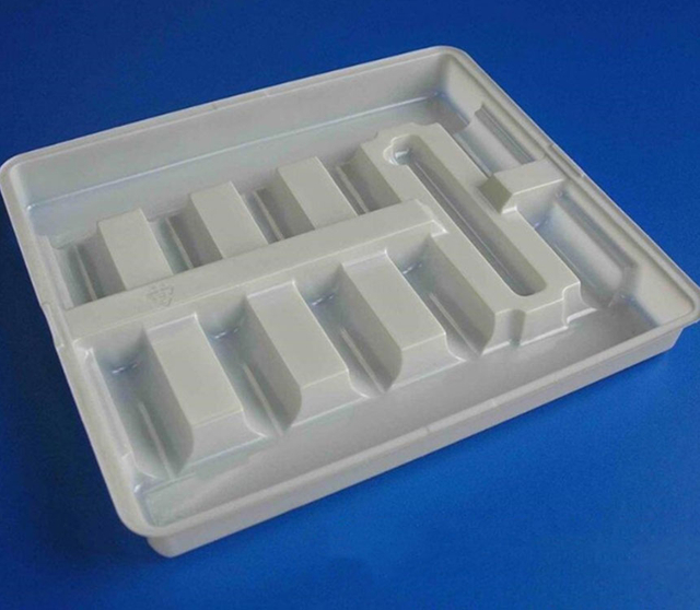 Medical packaging oral liquid inserts