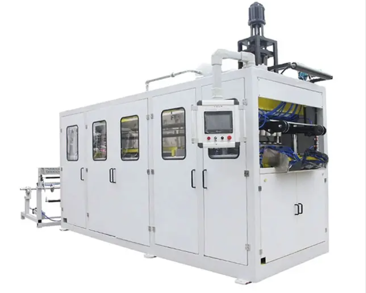 Image of a plastic cup thermoforming machine, highlighting the automated process of forming and cutting plastic cups with high precision and efficiency.