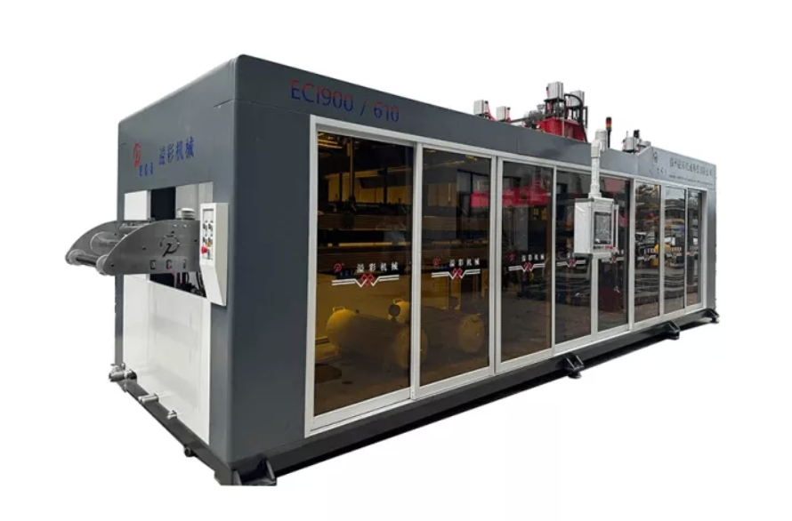 A thermoforming machine in operation, heating and molding plastic sheets into precise shapes using a combination of heat and pressure. 