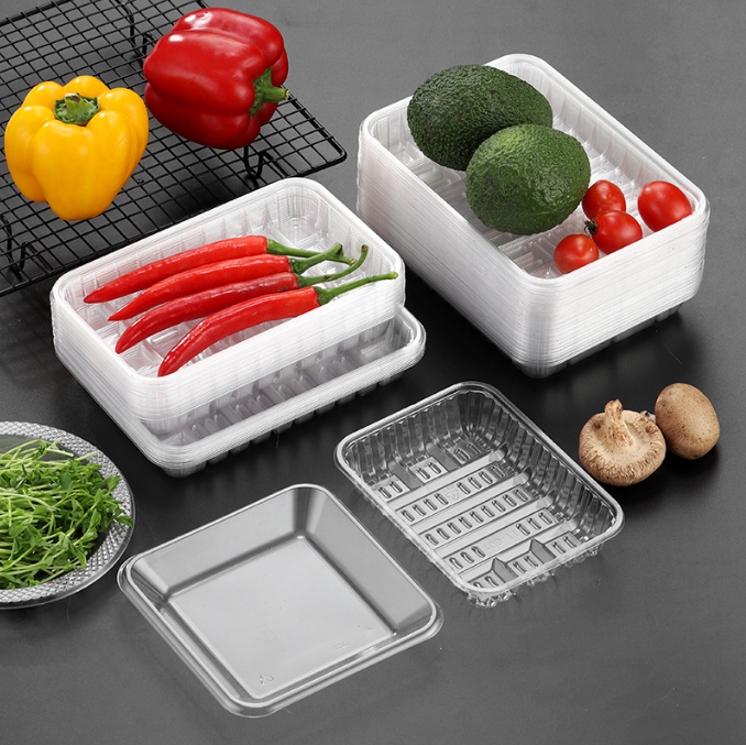 White vegetable plastic tray