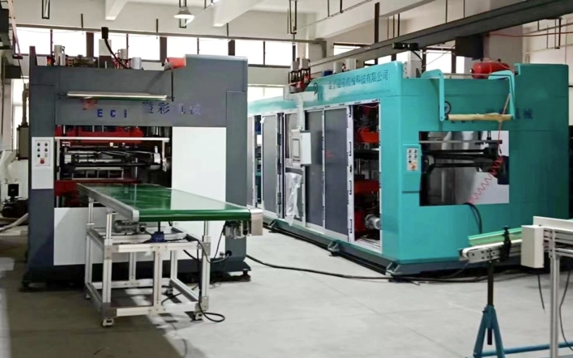 Image of a thermoforming machine factory, showcasing the production line where thermoforming machines are assembled and tested for quality and performance.